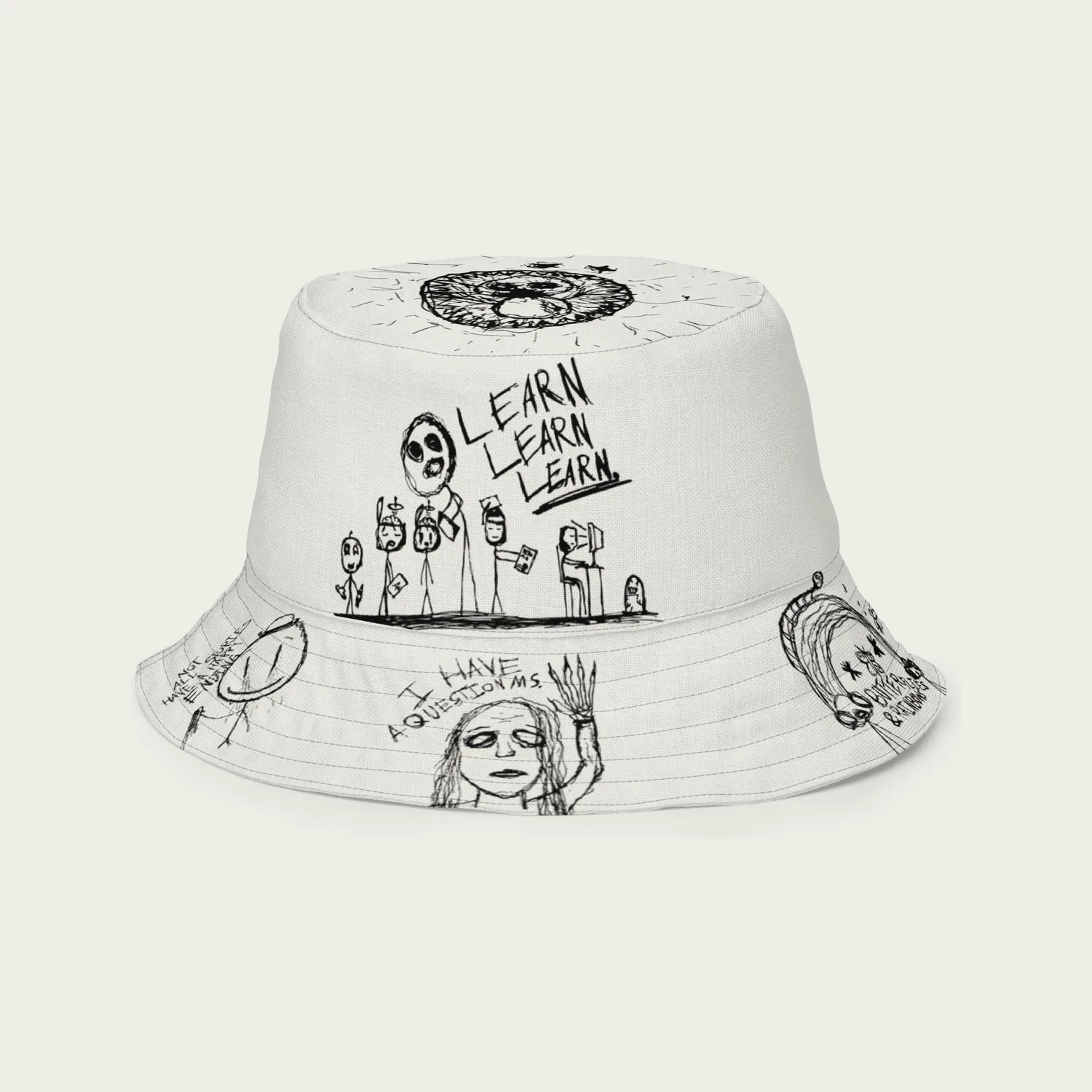 A white bucket hat covered in pen drawings: stick figures, a staring face and the words Learn, learn, learn